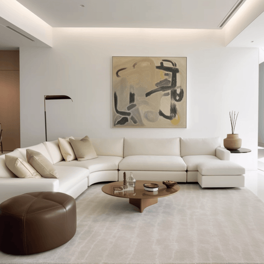 Minimalist living room with grey sectional sofa, wooden coffee table, white shag rug, abstract art prints, and no clutter for a clean look.